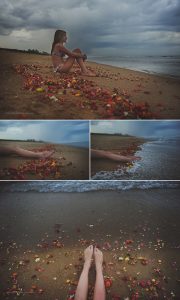 details of a girl sitting in flowers on a beach in Chennai, India, by travel photographer, Kirsty Larmour