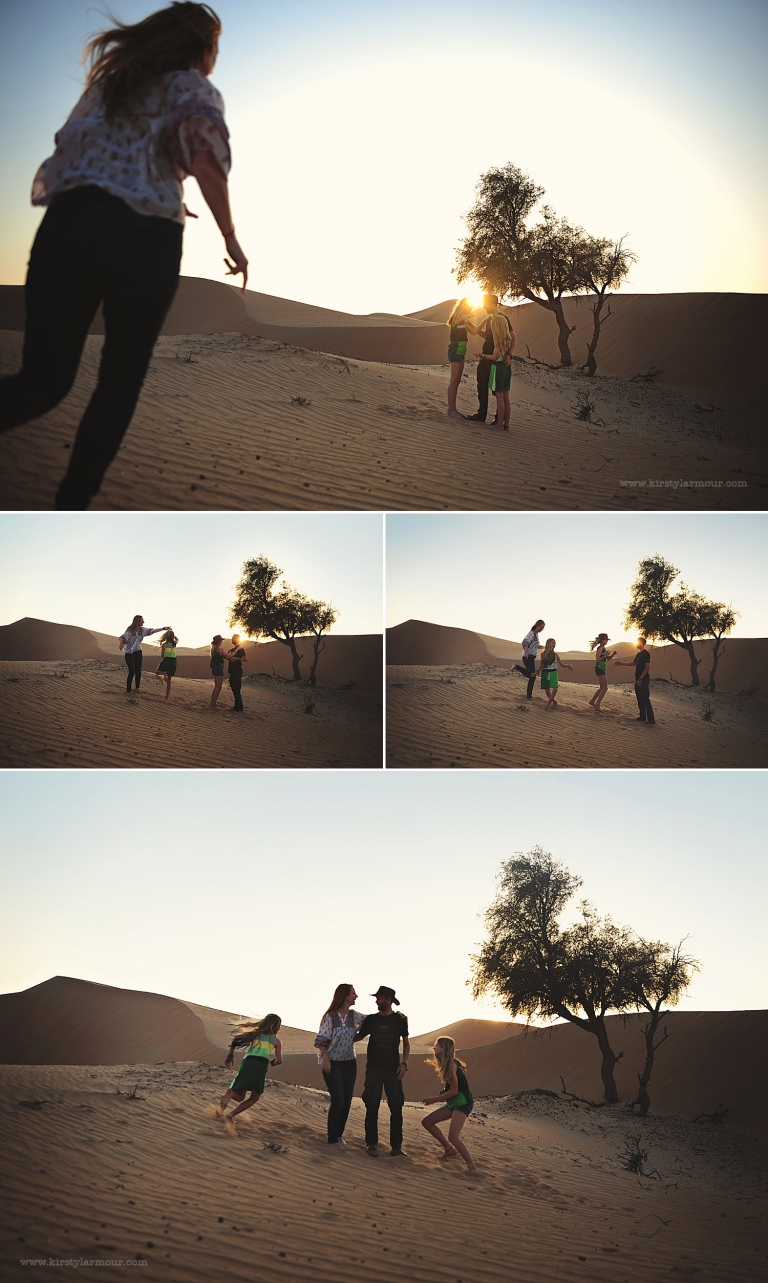 A Mum runs to get in a photo in the Abu Dhabi desert - Kirsty Larmour